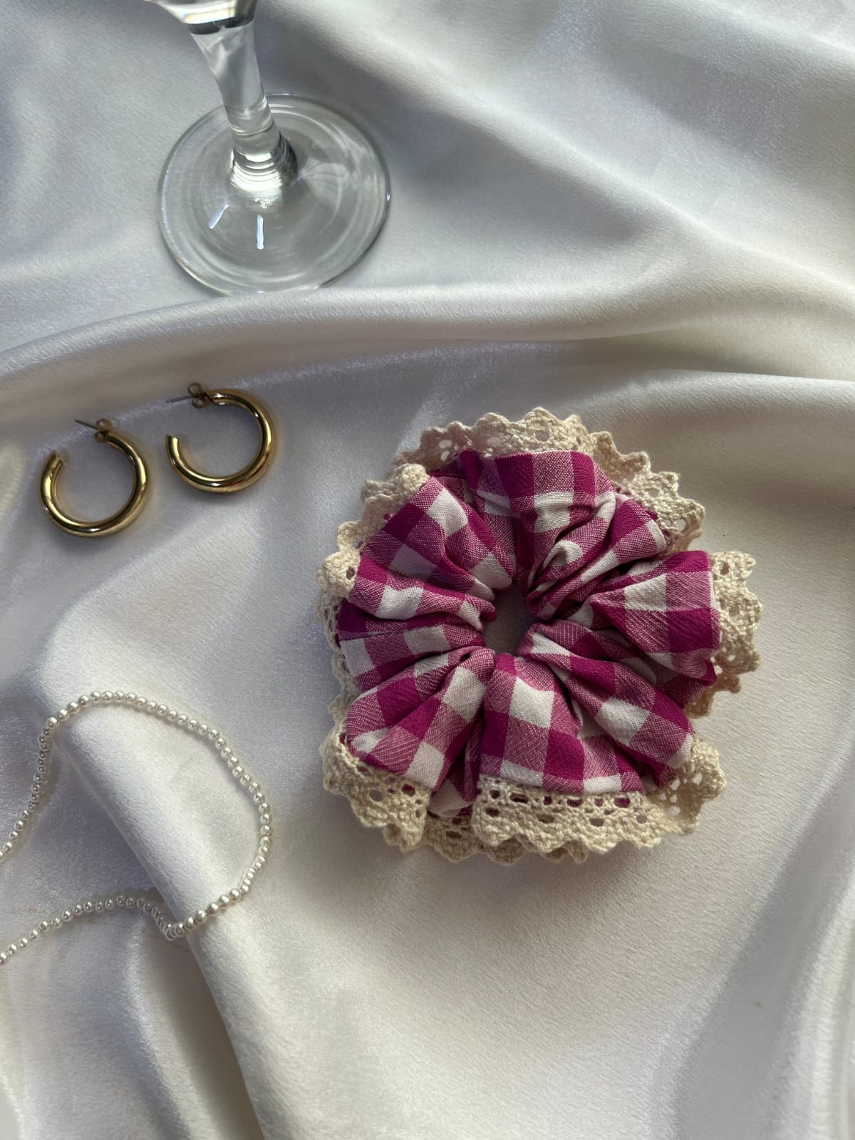 Pink checkerboard textured scrunchie